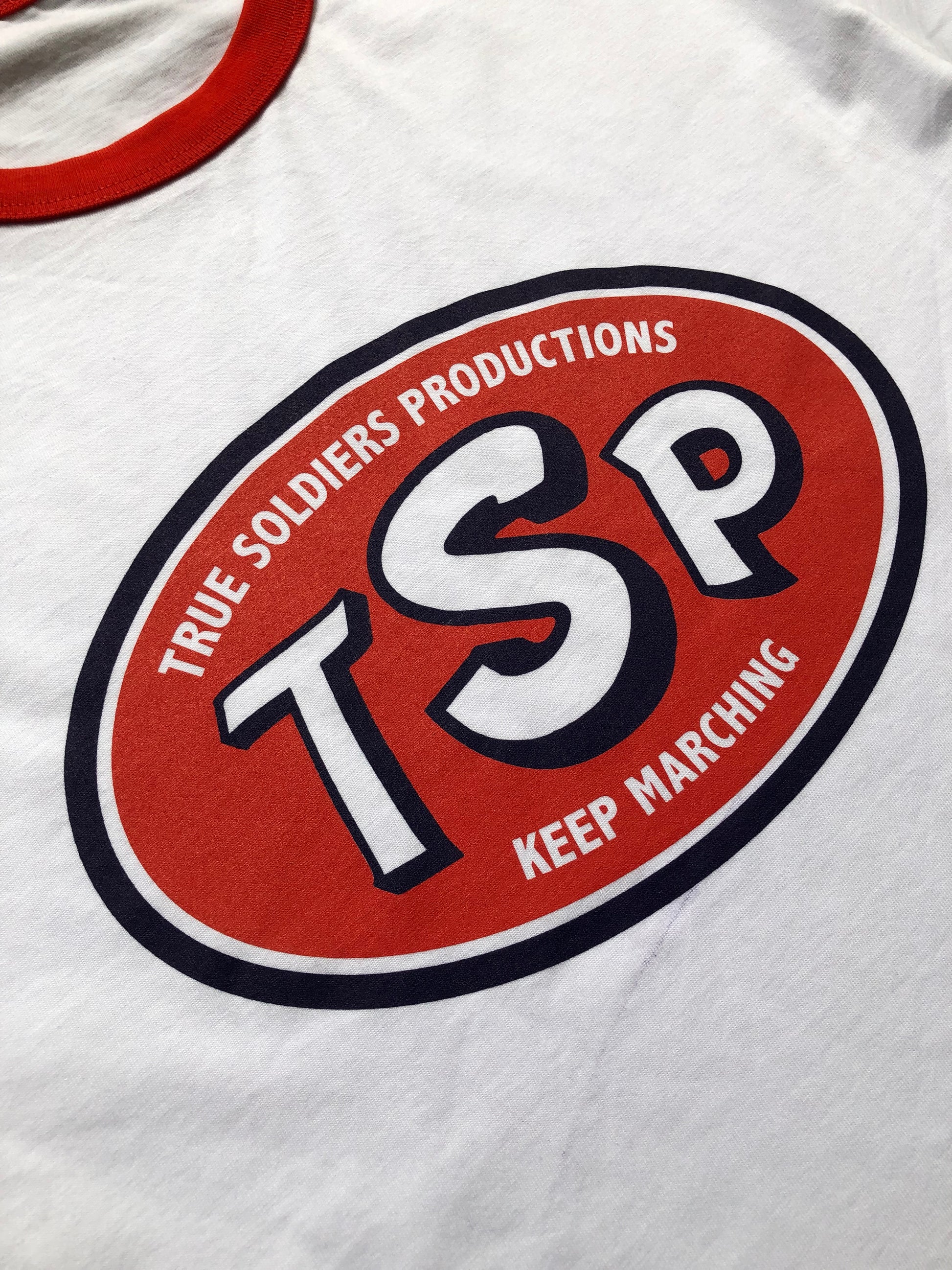 Close Up TSP *Keep Marching* Red Ringer T-Shirt